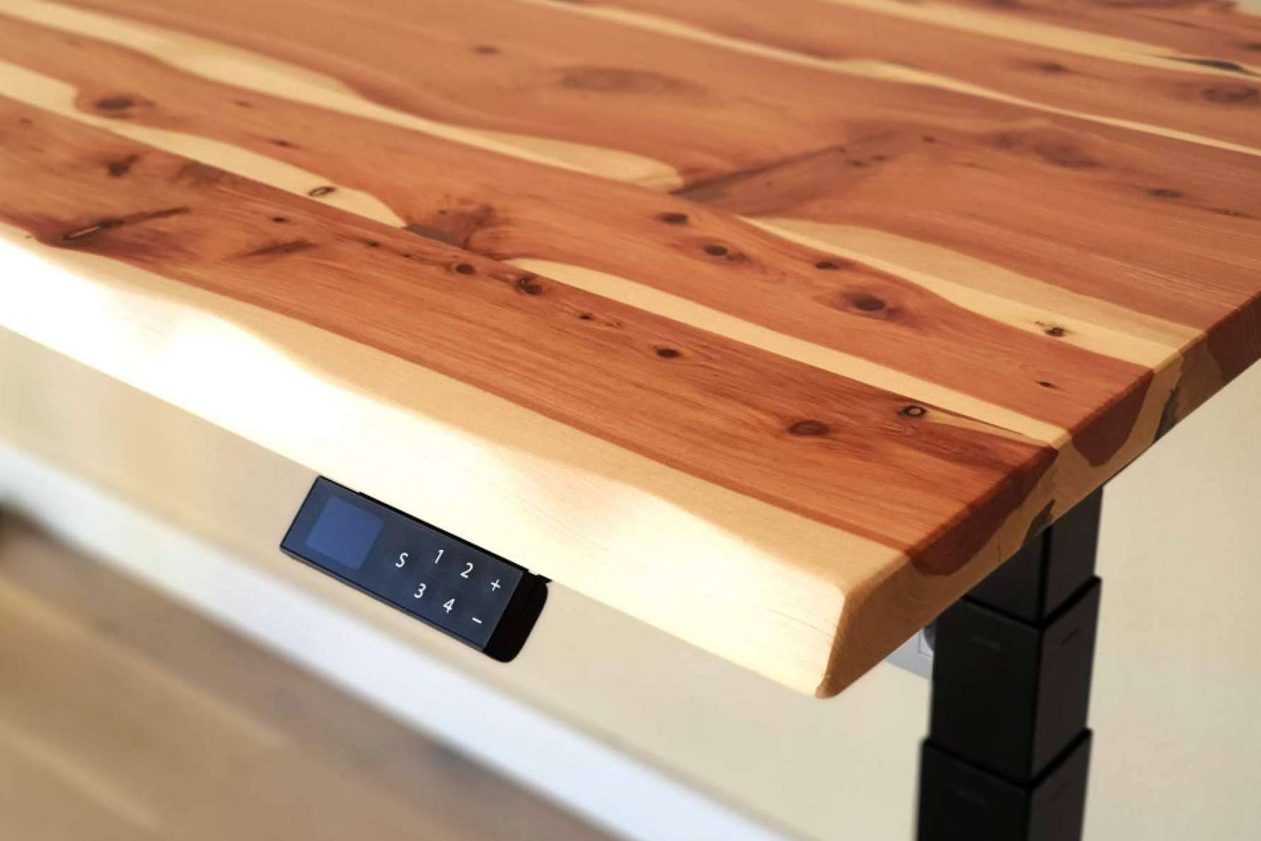 Beneficios de trabajar con escritorios ergonómicos elevables, por ErgoNatureWood